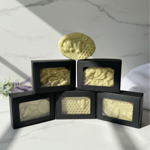 Liquid Gold Golden Silk Body Melt lotion bar with honeycomb bee mold and lavender vanilla scent for a rich protective skin barrier